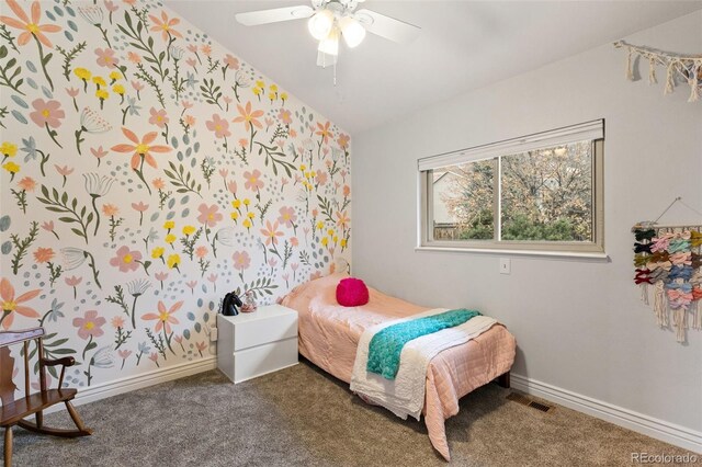 carpeted bedroom with ceiling fan