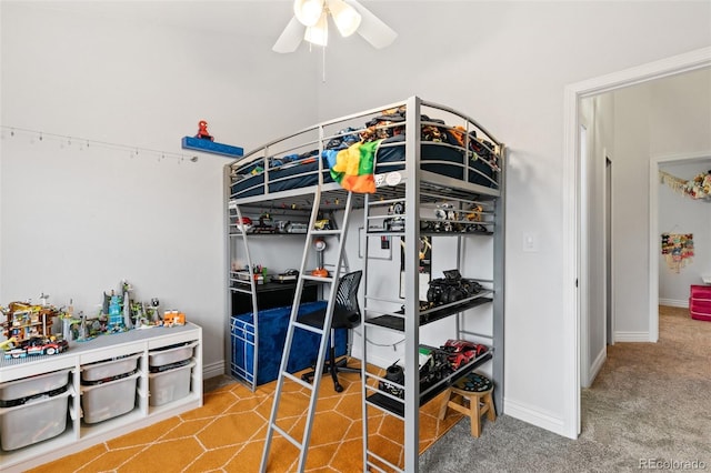 carpeted bedroom featuring ceiling fan