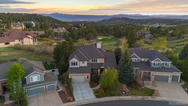 7071 Turweston Ln, Castle Pines, CO 80108 - view of property location with mountains and nearby suburban area
