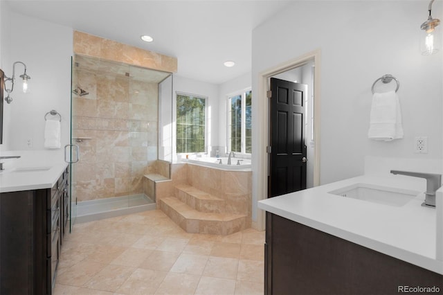 7071 Turweston Ln, Castle Pines, CO 80108 - full bath with a stall shower, vanity, tile patterned floors, a garden tub, and recessed lighting