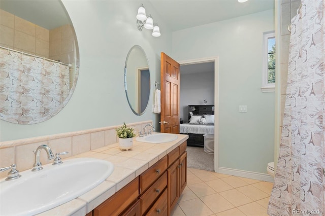7071 Turweston Ln, Castle Pines, CO 80108 - bathroom with tile patterned flooring, double vanity, toilet, a shower with curtain, and connected bathroom