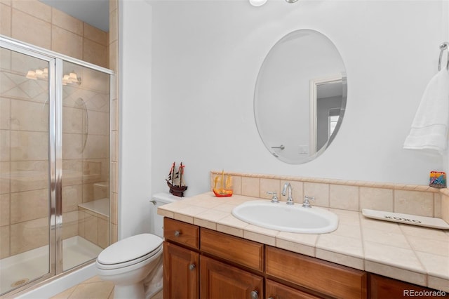 7071 Turweston Ln, Castle Pines, CO 80108 - full bathroom with a stall shower, toilet, vanity, and tile patterned flooring