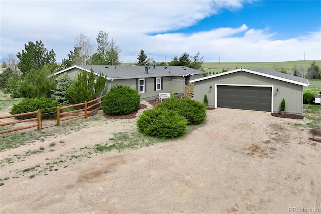 16580 Sagecreek Rd, Peyton, CO 80831 - ranch-style house featuring a detached garage