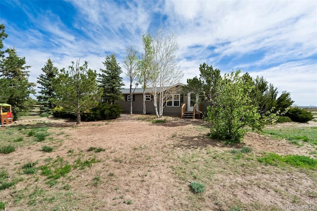 16580 Sagecreek Rd, Peyton, CO 80831 - view of yard featuring entry steps