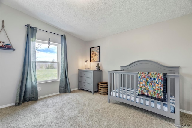 16580 Sagecreek Rd, Peyton, CO 80831 - bedroom with carpet flooring, a textured ceiling, baseboards, and lofted ceiling