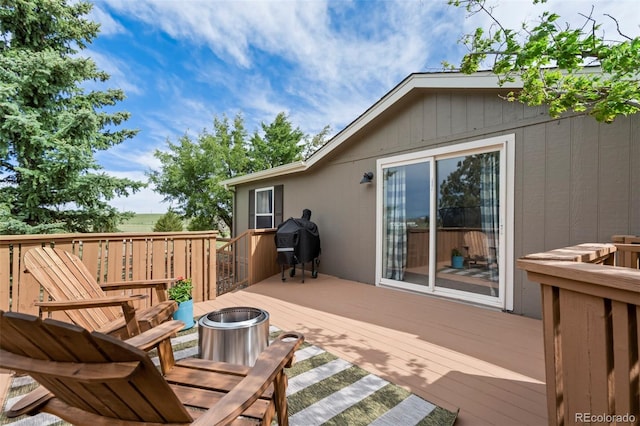 16580 Sagecreek Rd, Peyton, CO 80831 - wooden terrace with area for grilling