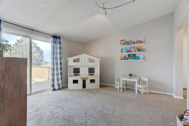 16580 Sagecreek Rd, Peyton, CO 80831 - carpeted bedroom with access to outside and a textured ceiling