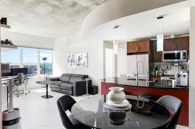 891 14th St Unit 2816, Denver, CO 80202 - dining space featuring a desk and light marble finish floors