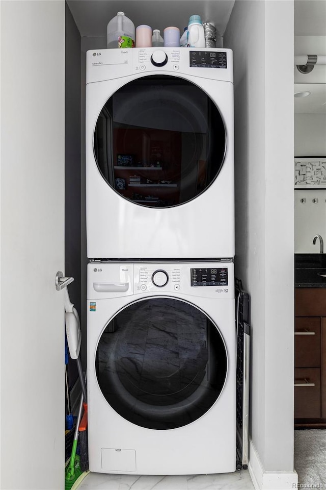 891 14th St Unit 2816, Denver, CO 80202 - laundry area with stacked washer / dryer