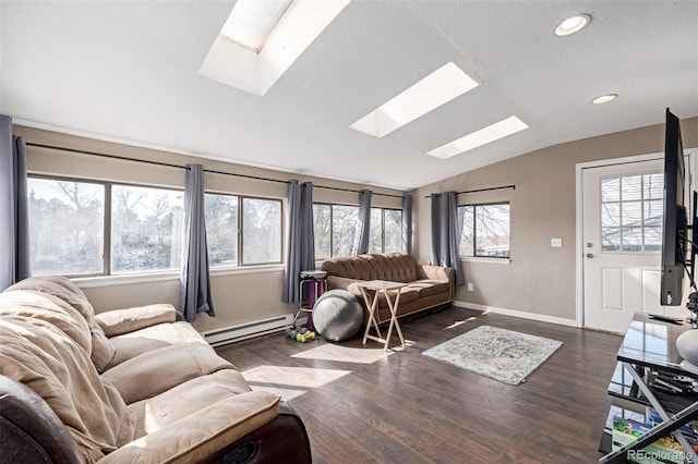 living area featuring dark wood-style floors, recessed lighting, a baseboard heating unit, lofted ceiling with skylight, and baseboards