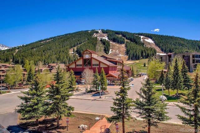 105 Wheeler Cir Unit 334, Frisco, CO 80443 - aerial view of a heavily wooded area and mountains