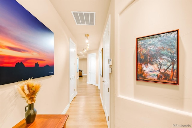 hall featuring light hardwood / wood-style flooring