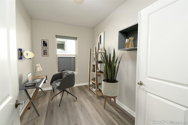 office space featuring hardwood / wood-style floors