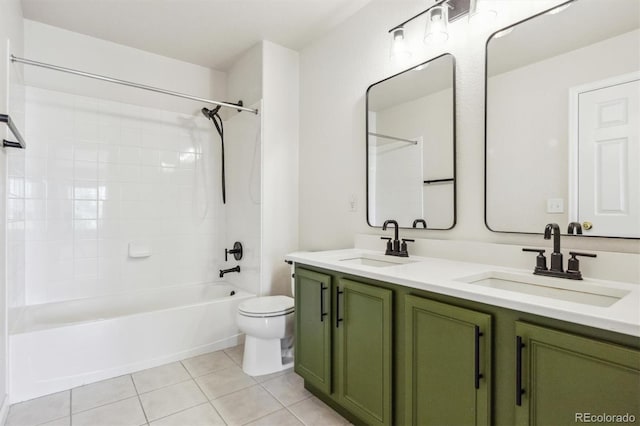 full bath with toilet, tile patterned flooring, double vanity, and shower / bathtub combination