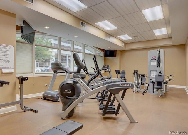1827 N Grant St Unit 604, Denver, CO 80203 - exercise room with baseboards and a paneled ceiling