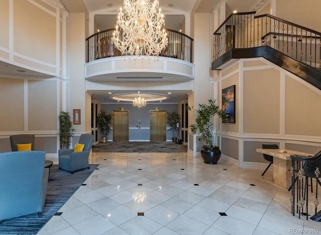 1827 N Grant St Unit 604, Denver, CO 80203 - common area with a high ceiling, stairway, and a decorative wall