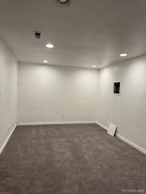 16753 E Ithaca Pl, Aurora, CO 80013 - below grade area featuring dark colored carpet and recessed lighting