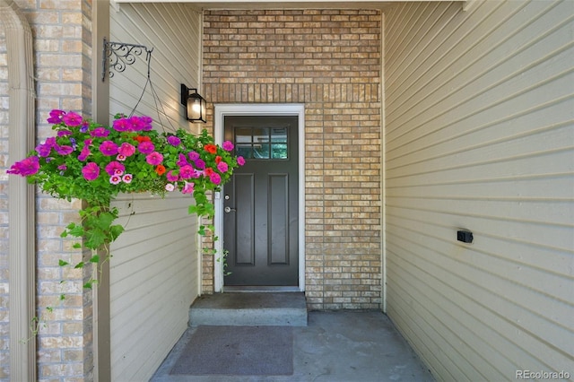 6468 S Forest St, Centennial, CO 80121 - entrance to property featuring brick siding