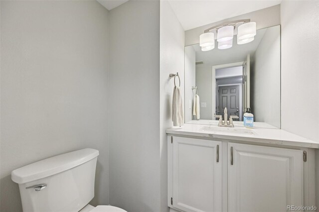 6468 S Forest St, Centennial, CO 80121 - half bathroom with toilet and vanity