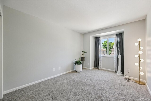 6468 S Forest St, Centennial, CO 80121 - carpeted empty room featuring baseboards