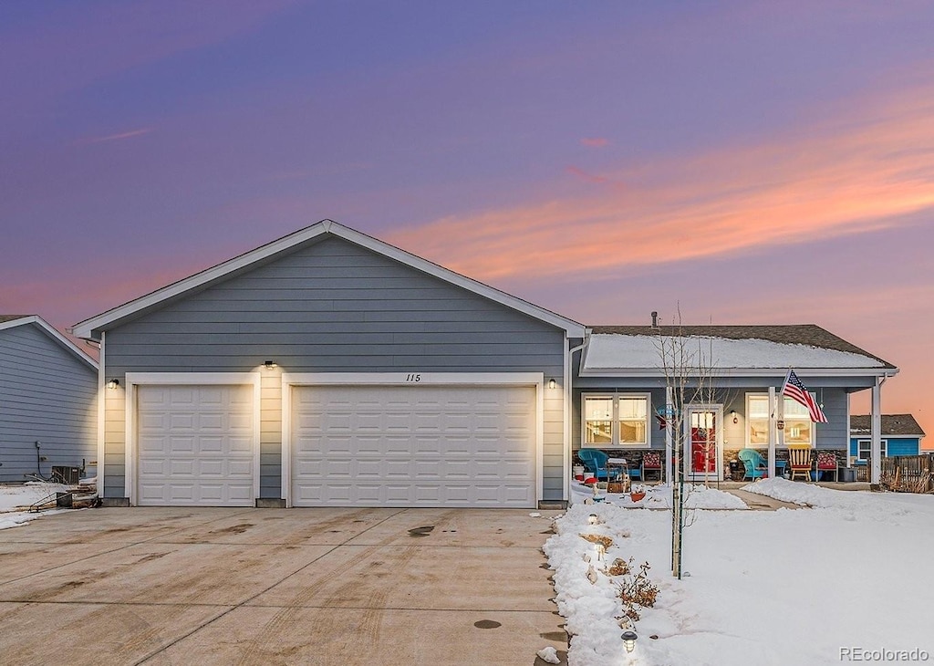 view of front of property with a garage