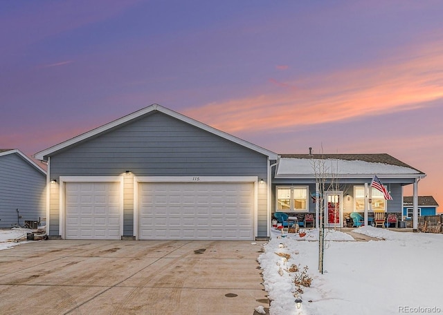 view of front of property with a garage