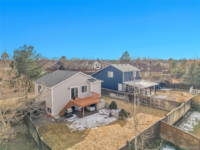 back of house with a residential view and a fenced backyard