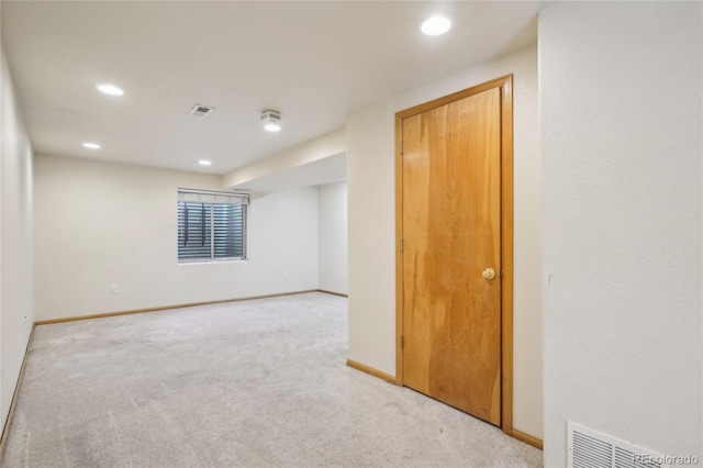1481 Box Prairie Cir, Loveland, CO 80538 - spare room featuring light carpet, recessed lighting, and baseboards