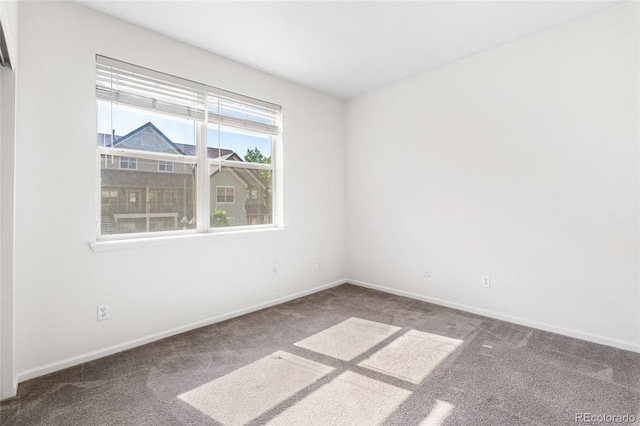 5444 Zephyr St Unit 203, Arvada, CO 80002 - carpeted spare room with baseboards