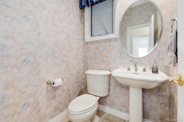34274 Wolf Creek Trl, Kiowa, CO 80117 - bathroom featuring toilet, baseboards, and tile patterned flooring