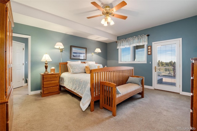 34274 Wolf Creek Trl, Kiowa, CO 80117 - bedroom featuring light colored carpet, access to exterior, baseboards, and a ceiling fan