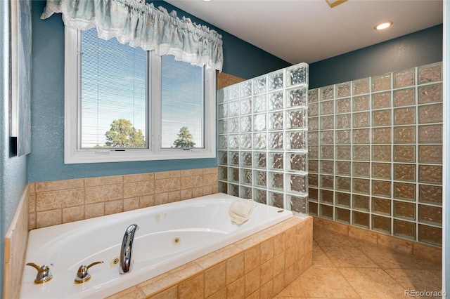 34274 Wolf Creek Trl, Kiowa, CO 80117 - full bath featuring a tub with jets, tile patterned floors, and walk in shower