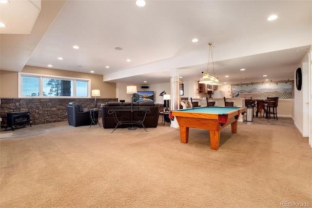 34274 Wolf Creek Trl, Kiowa, CO 80117 - rec room with light carpet, a wood stove, billiards, recessed lighting, and ornate columns