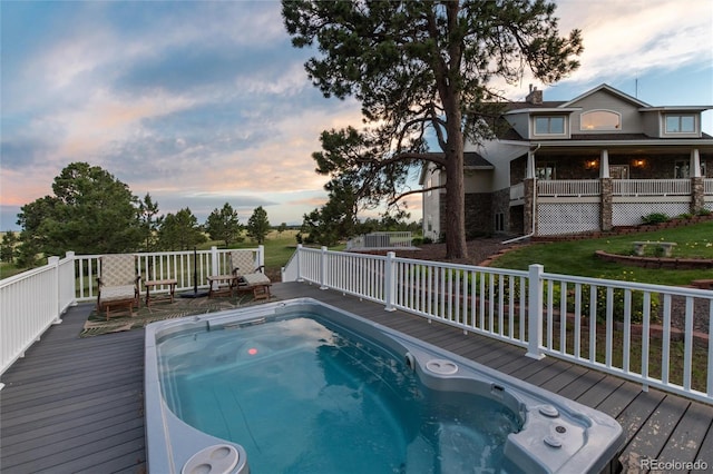 34274 Wolf Creek Trl, Kiowa, CO 80117 - pool at dusk featuring a deck