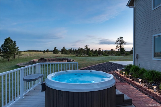 34274 Wolf Creek Trl, Kiowa, CO 80117 - deck at dusk featuring a hot tub