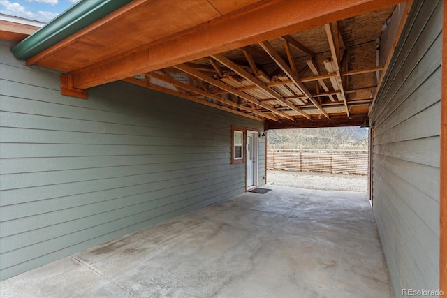 view of patio / terrace featuring an attached carport