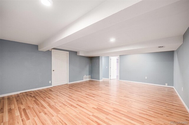 7834 S Windermere Cir, Littleton, CO 80120 - finished below grade area with light wood finished floors and recessed lighting