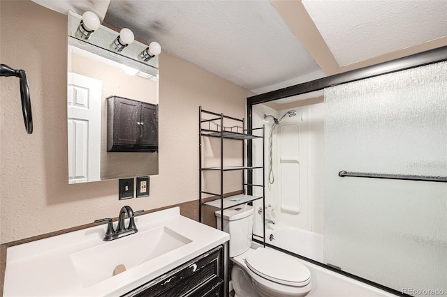 7834 S Windermere Cir, Littleton, CO 80120 - bathroom featuring vanity, bath / shower combo with glass door, a textured ceiling, and a textured wall