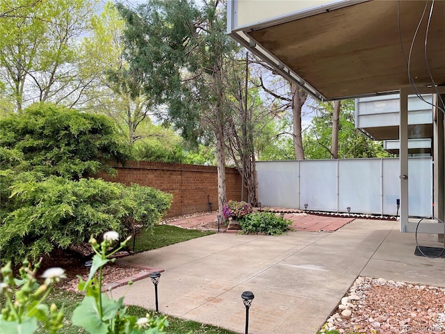 2500 S York St Unit 116, Denver, CO 80210 - fenced backyard with a patio