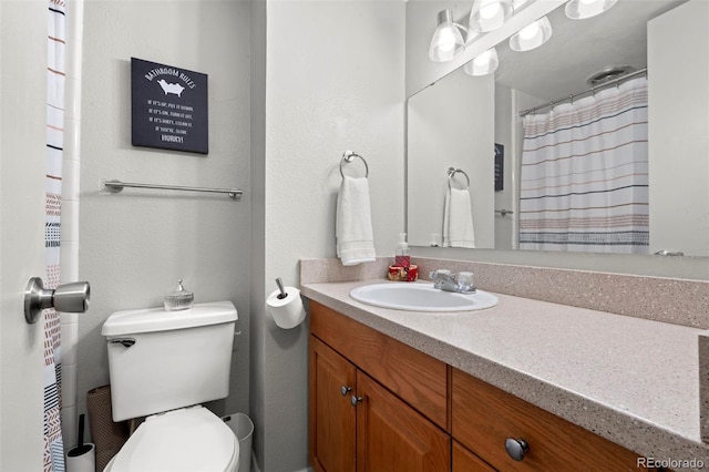2500 S York St Unit 116, Denver, CO 80210 - full bath featuring vanity and toilet
