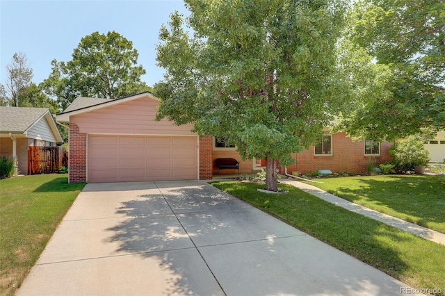 2920 S York St, Denver, CO 80210 - view of front of property with brick siding, concrete driveway, and a garage