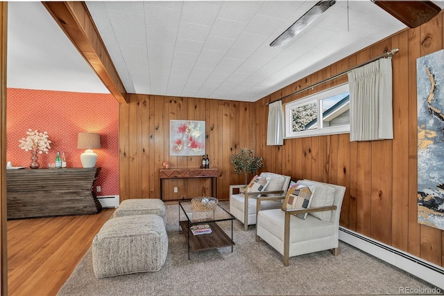 2920 S York St, Denver, CO 80210 - living room with a baseboard heating unit, baseboard heating, wood finished floors, and wood walls