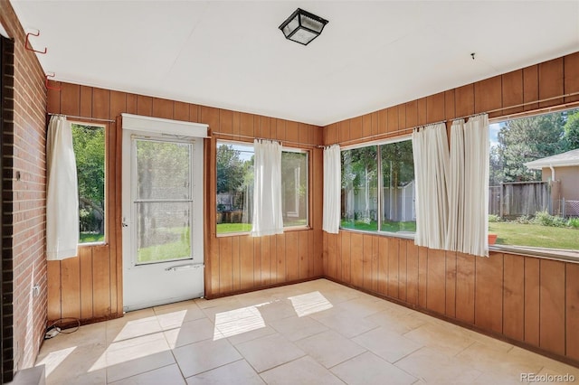 2920 S York St, Denver, CO 80210 - unfurnished sunroom with wooden walls and tile patterned floors