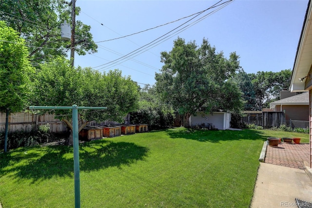 2920 S York St, Denver, CO 80210 - fenced backyard featuring a storage unit