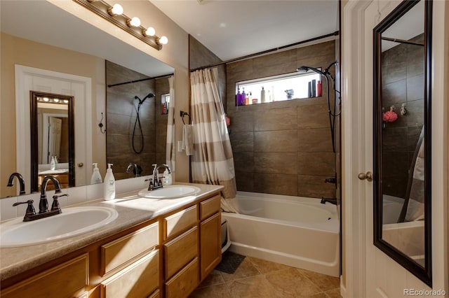 bathroom with vanity, tile patterned flooring, and shower / tub combo