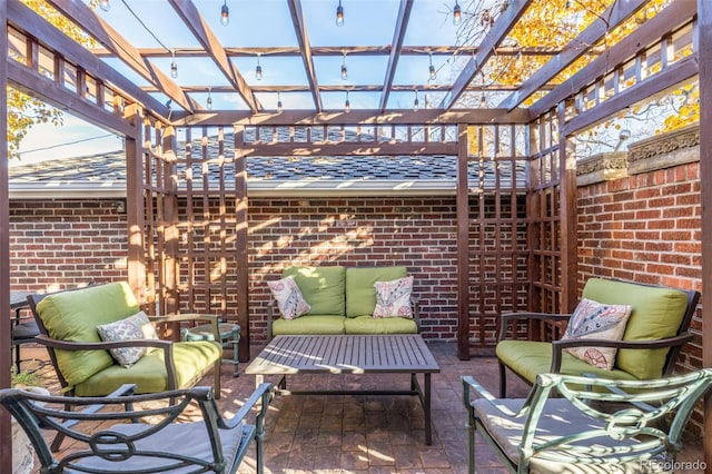 view of patio with an outdoor hangout area and a pergola