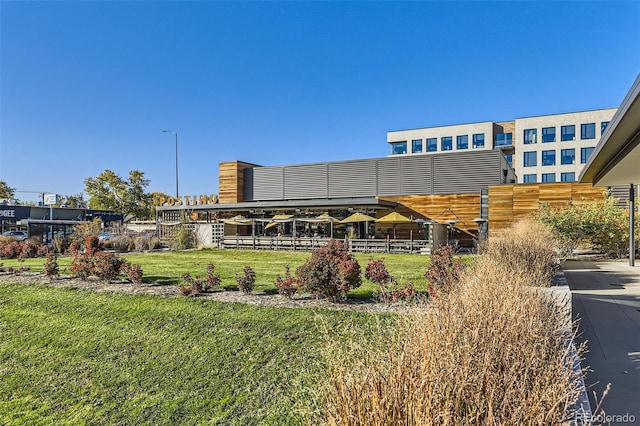 view of community featuring a lawn