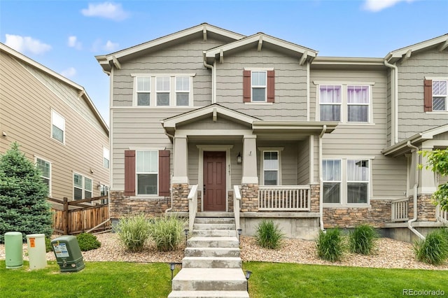 4343 S Nepal Ct, Centennial, CO 80015 - craftsman house with stone siding and a porch