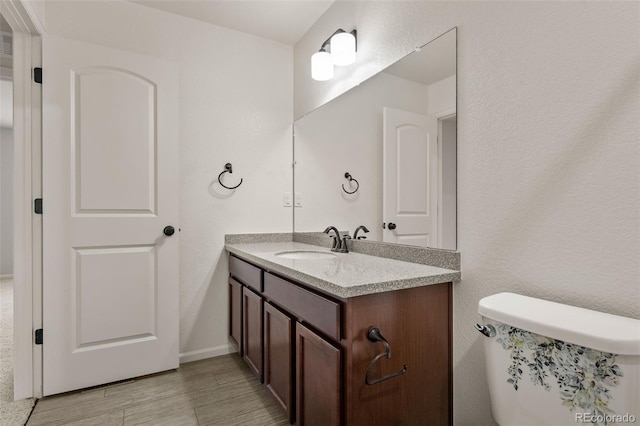 4343 S Nepal Ct, Centennial, CO 80015 - bathroom featuring vanity and wood finished floors