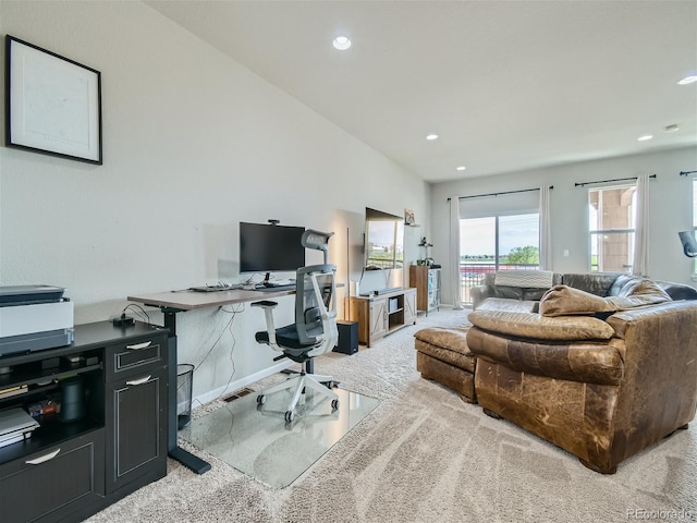 office space with light carpet, baseboards, and recessed lighting